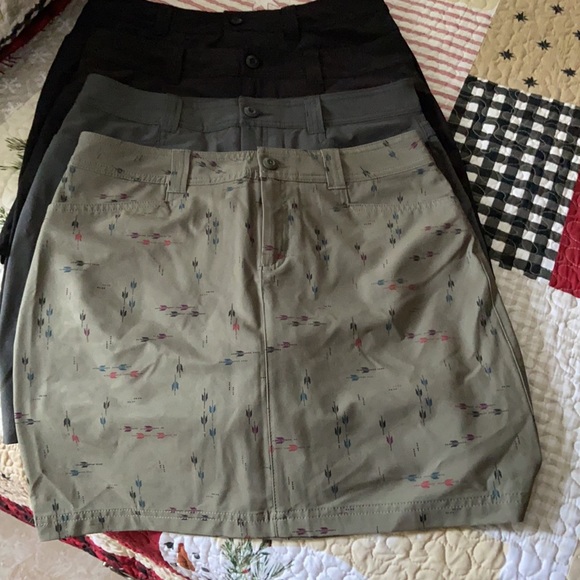 One is a green olive base with a print. All 4 for $20.00 - Picture 2 of 2